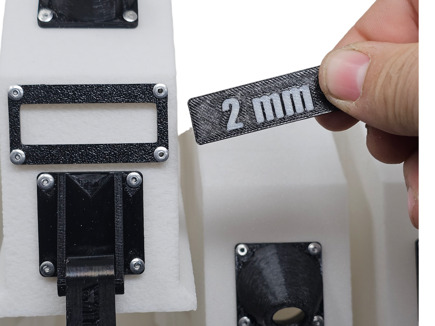 Pulling the wire size plate from the A5 Wire Condo for Bonsai