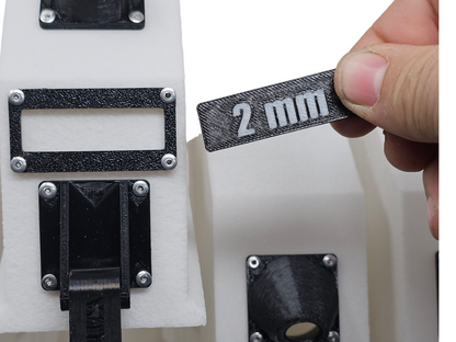 Pulling the wire size plate from the A5 Wire Condo for Bonsai